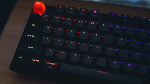 black and orange computer keyboard